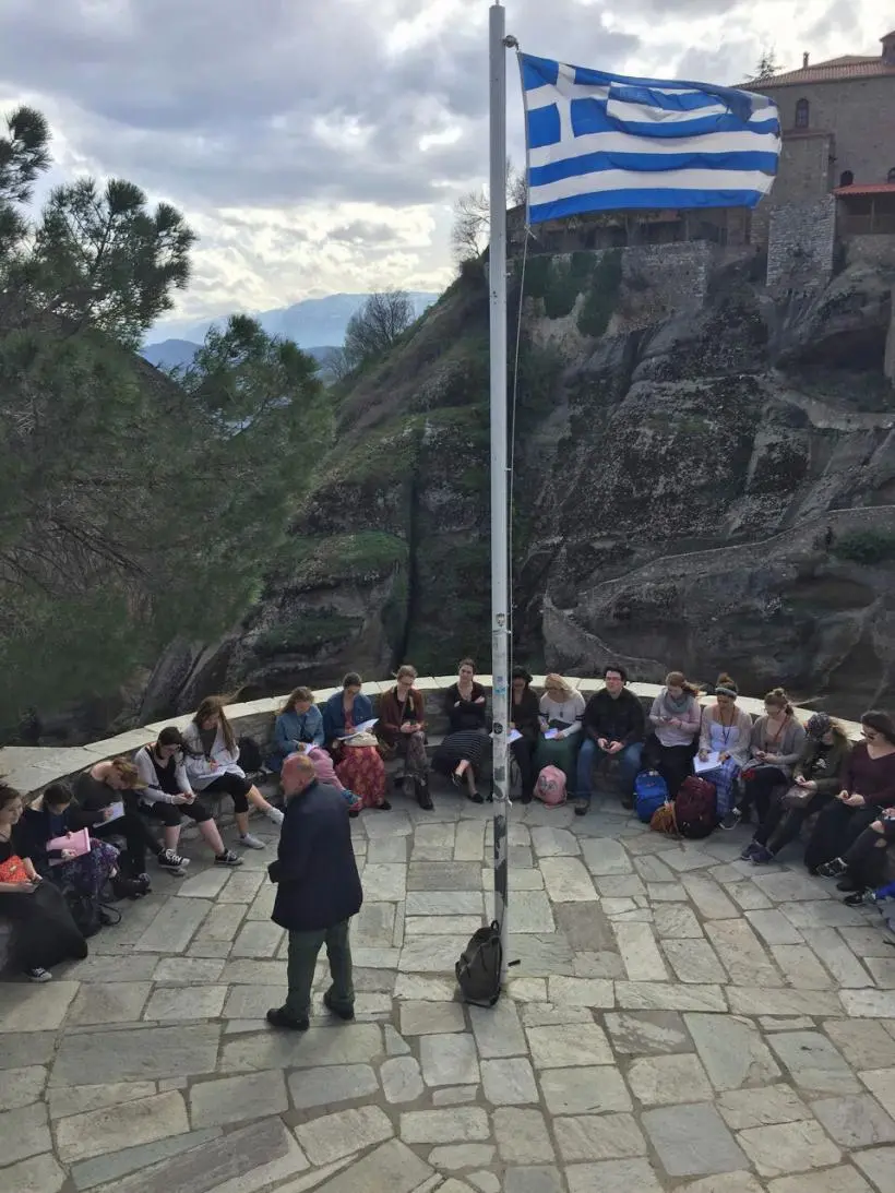 Arcadia students visit a mountainous landmark in Greece.
