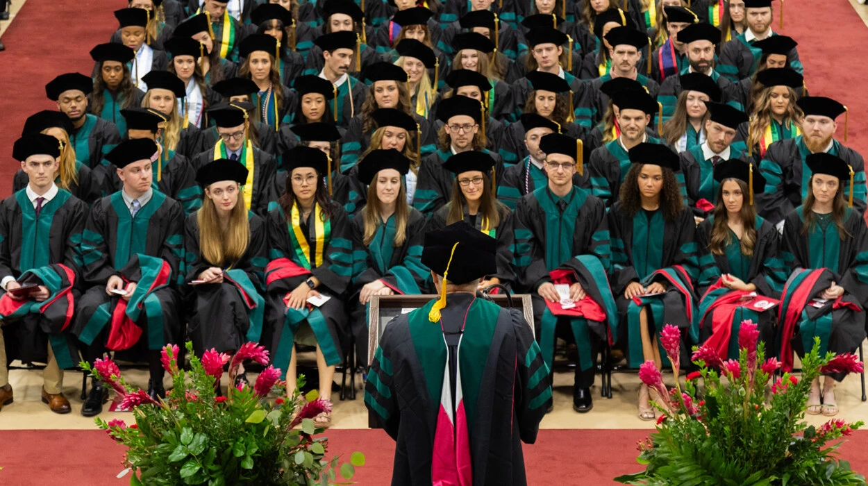 Physical therapy commencement graduates for 2023 sit during the ceremony.