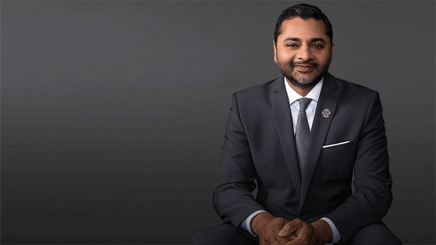 Headshot of President Nair in front of gray background