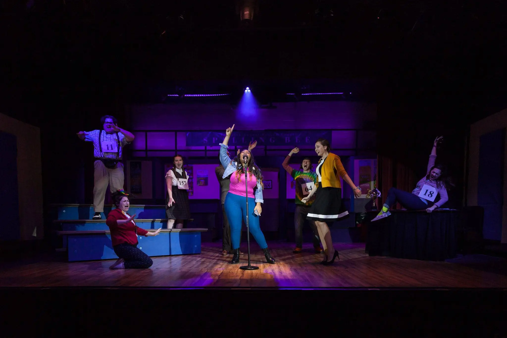 Students on stage performing the play The 25th Annual Putnam County Spelling Bee