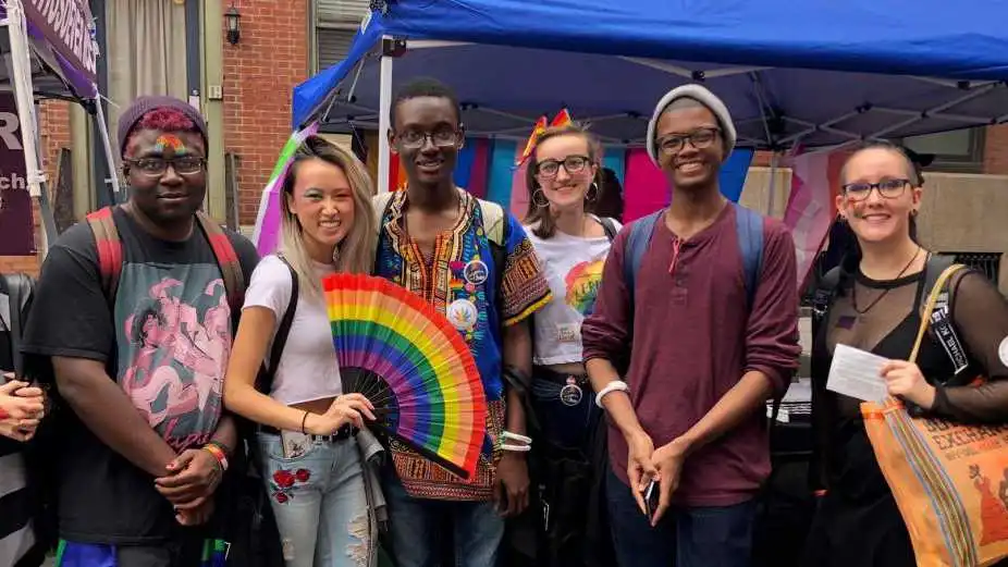 Group of students smiling at the camera.