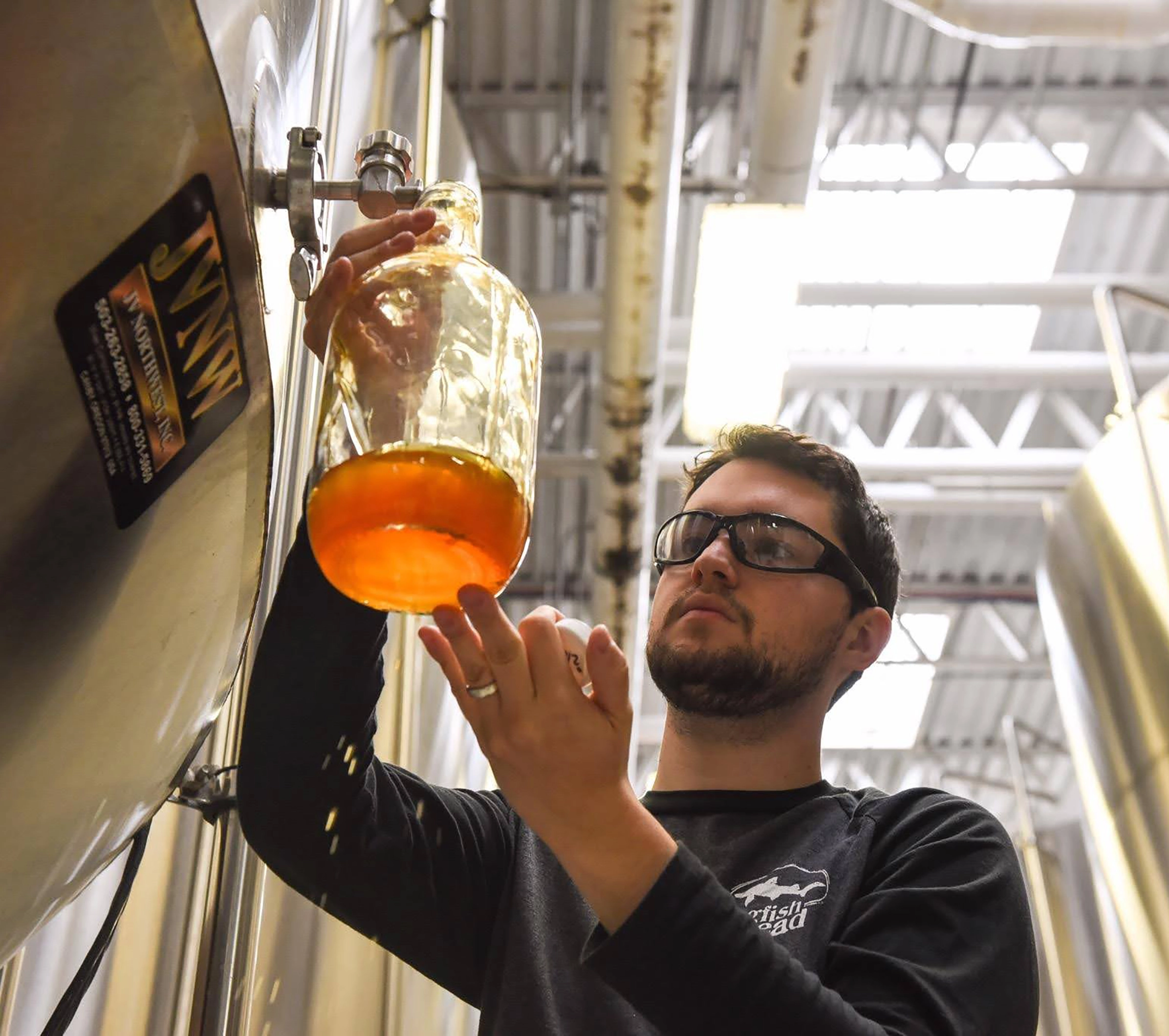 Arcadia Honors Student works on a beer chemistry project.