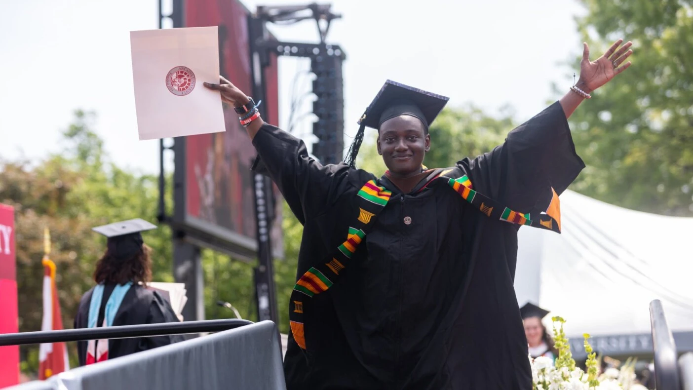 Ibrahim Sillah celebrates graduating from Arcadia.