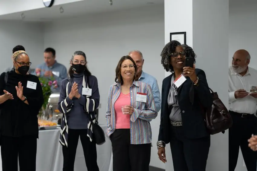 Executive Director of the Parkinsons Council Wendy Lewis, Erika Aaron, former Board Chair Alison Aaron Madsen, Esq. '85, and Vice President of Development and Alumni Engagement Brigette A. Bryant celebrate the unveiling of the new signage of the Dan Aaron Stay Fit Clinic.