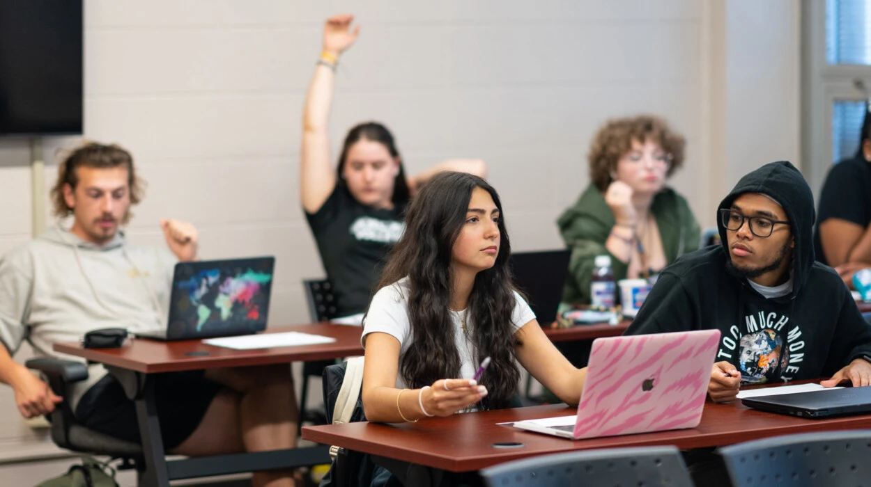 Students sit an education classroom