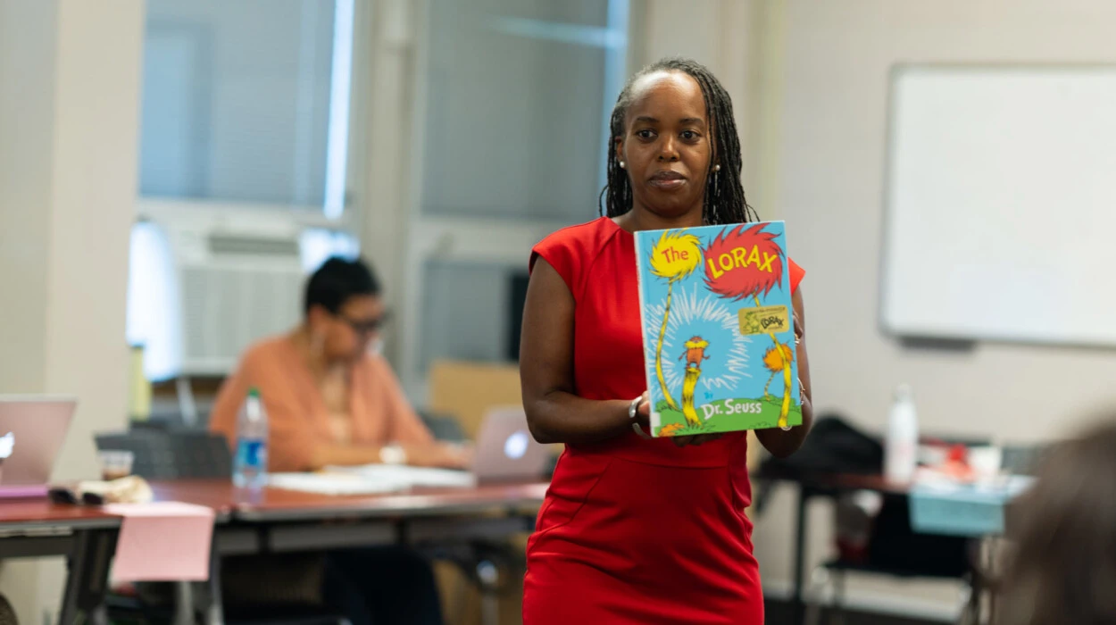 Professor Adams reads the Lorax to class.