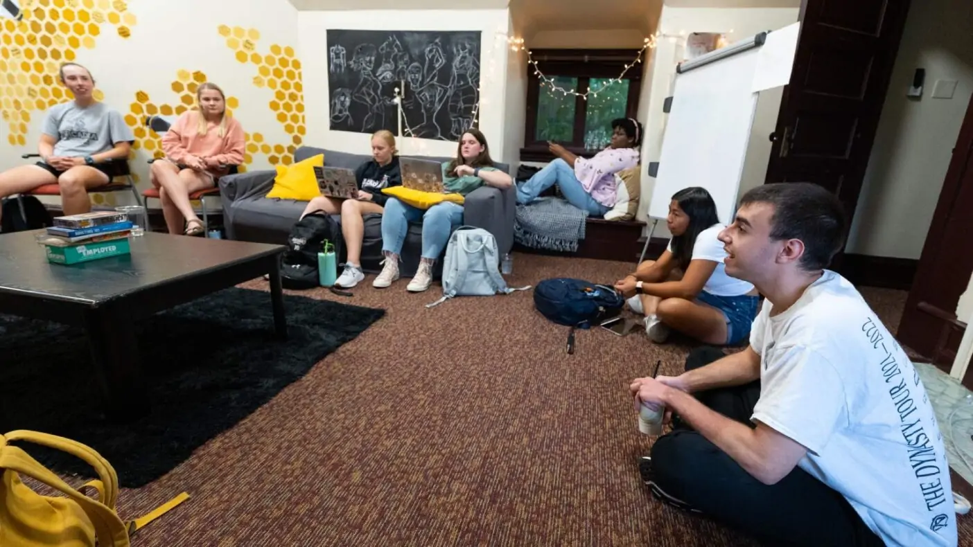 Students sit in an honors class in The Hive.