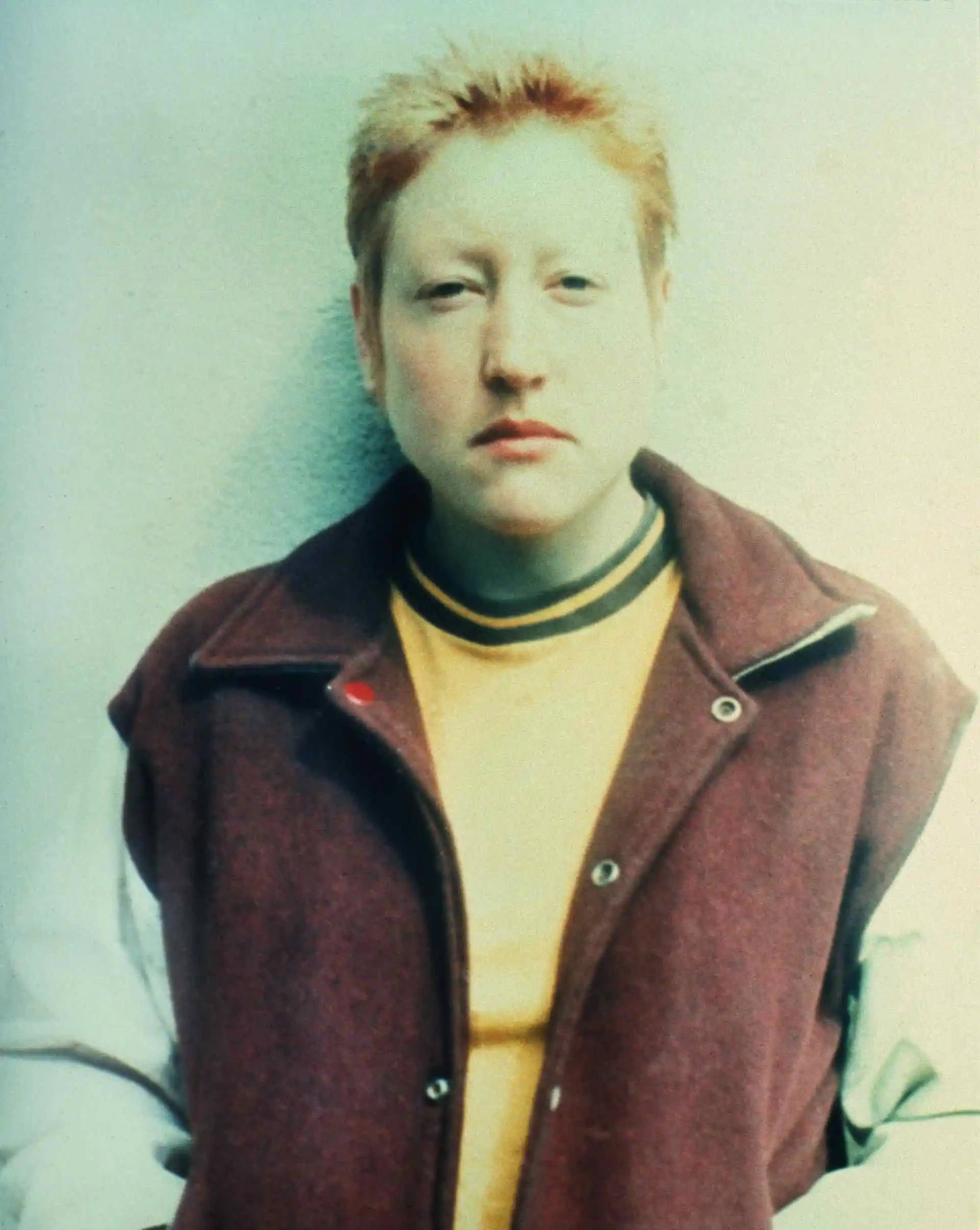 Martha Wilson Posturing: Male Impersonator (Butch), 1973 color photograph, text 20 1/2 x 10 5/8"