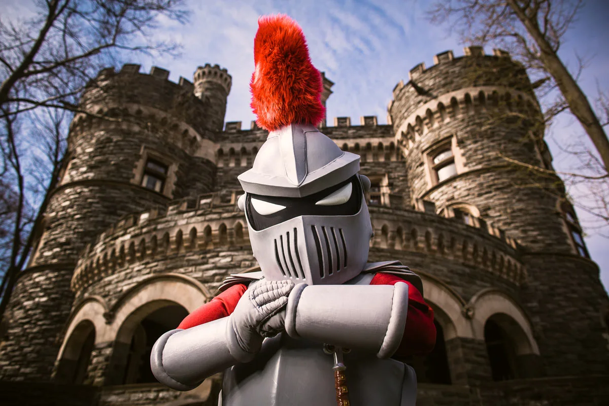 The Knight Mascot in front of the castle