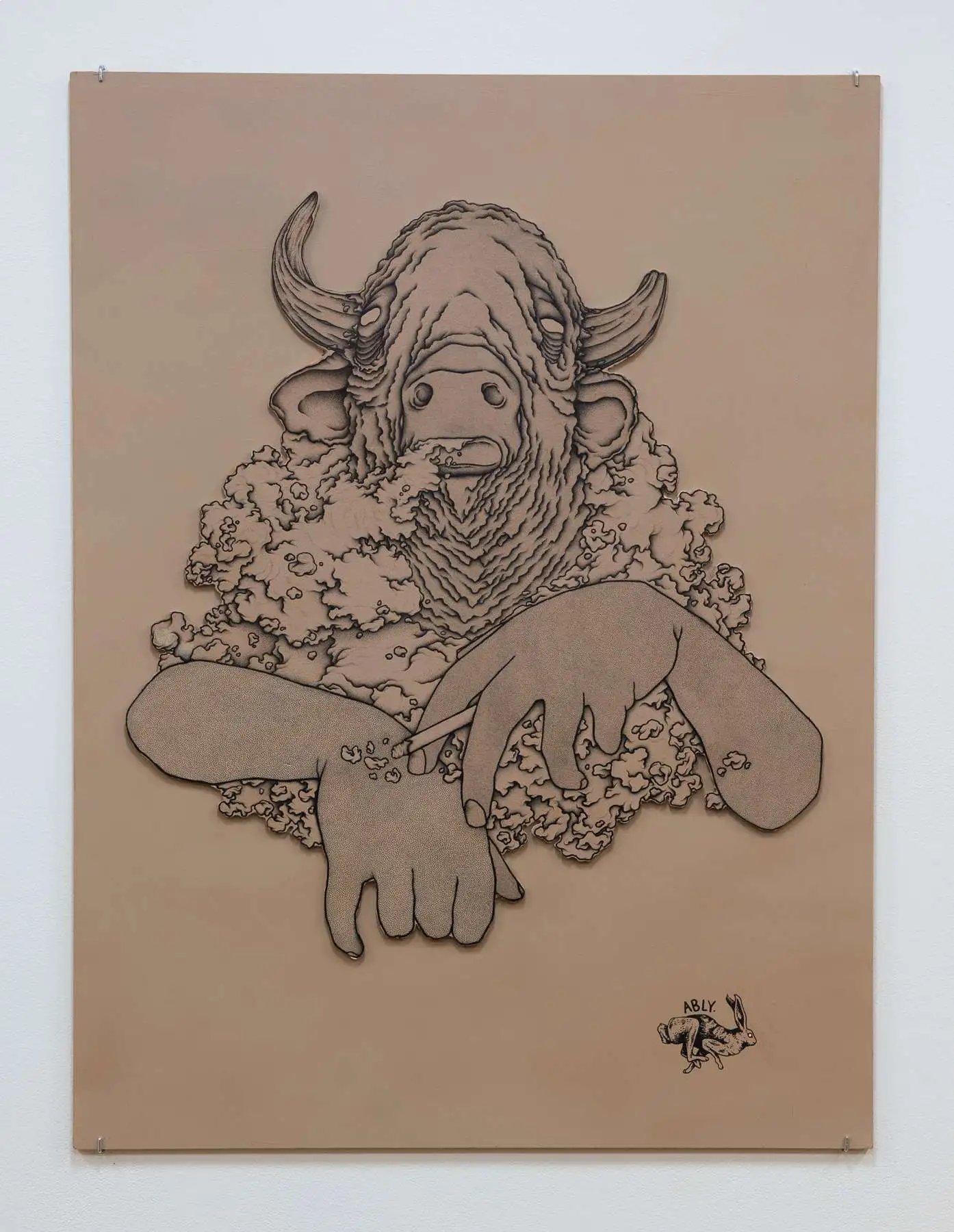 An art exhibition showing a bull with human hands smoking and being surrounded with smoking by puffing