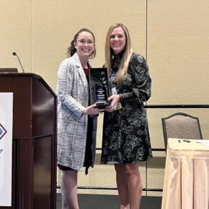 Mandi Mohr receiving an award at the 2023 AAFS Conference