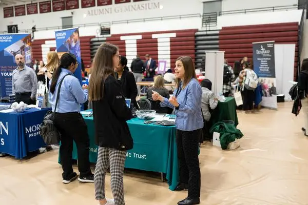 Students speak with potential employers at the 2023 Internship and Career Fair