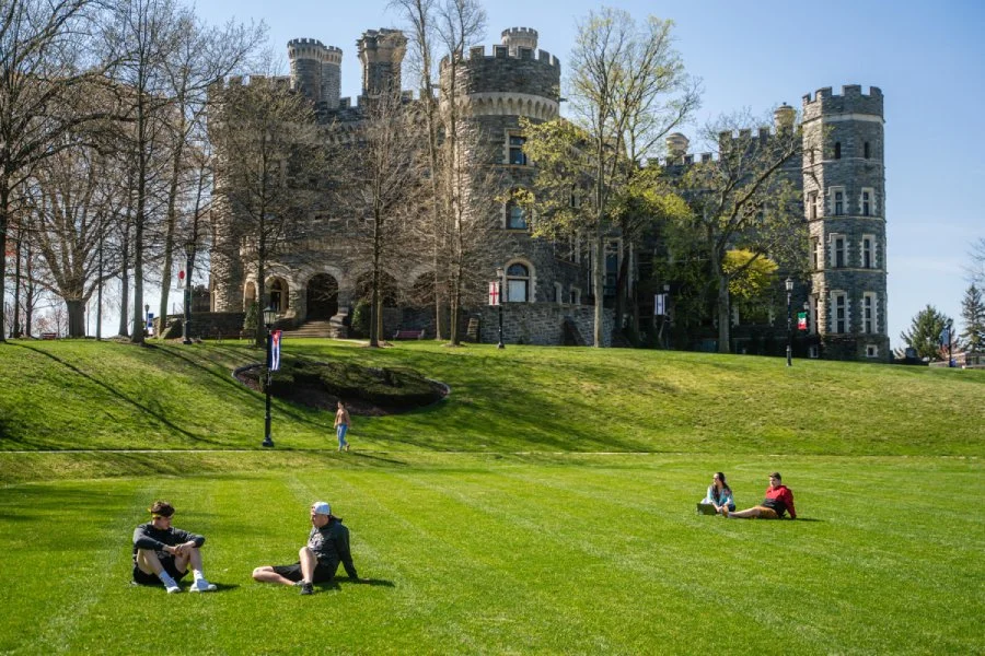Students relaxing on the lawn