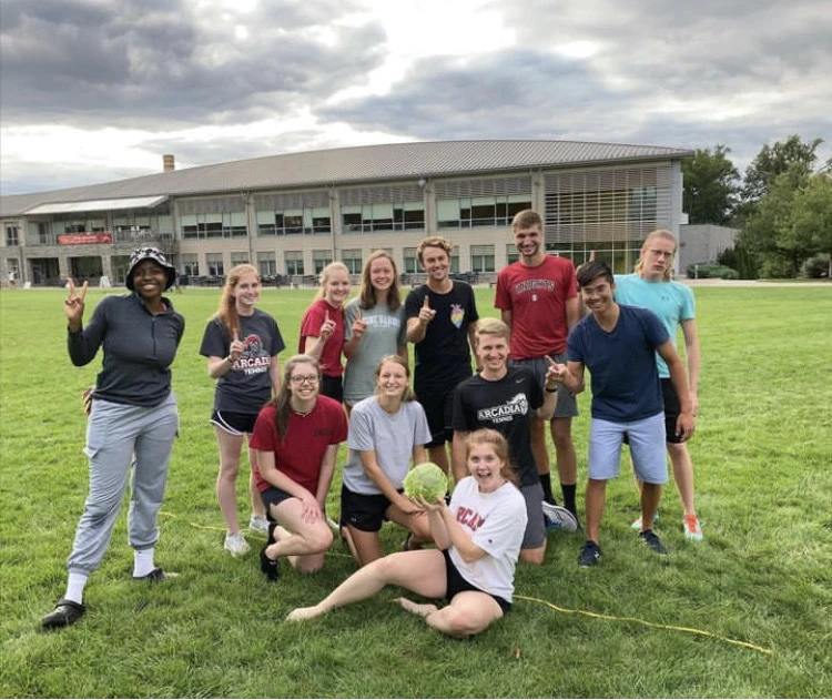 Brigid Whelihan '23 poses with a group of fellow students on Haber Green