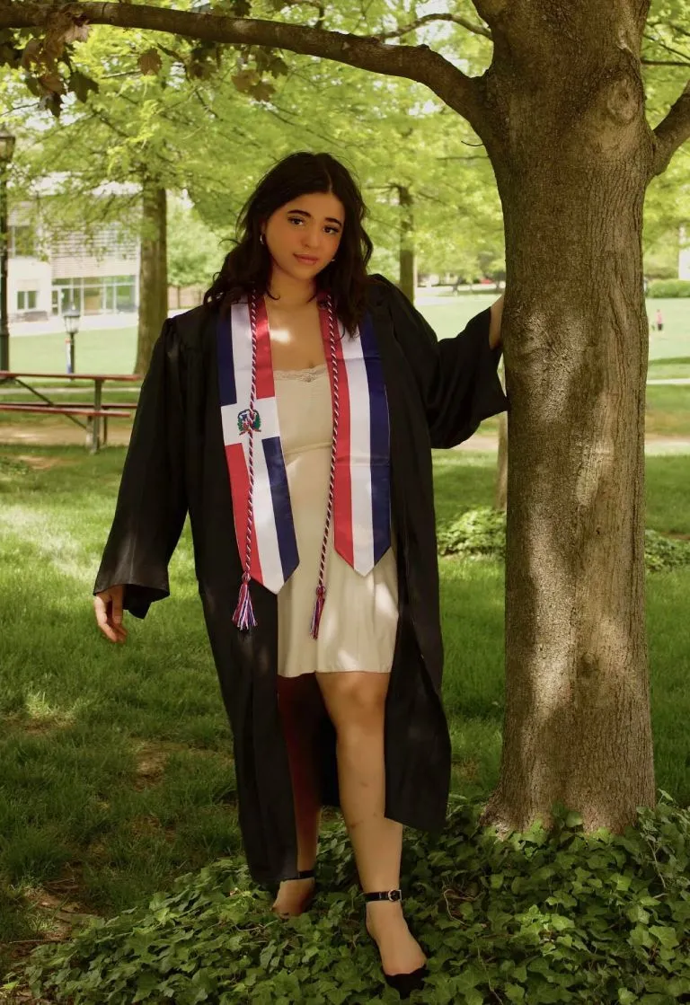 Lisa Maria DiSalvo '23 dressed in a graduation robe