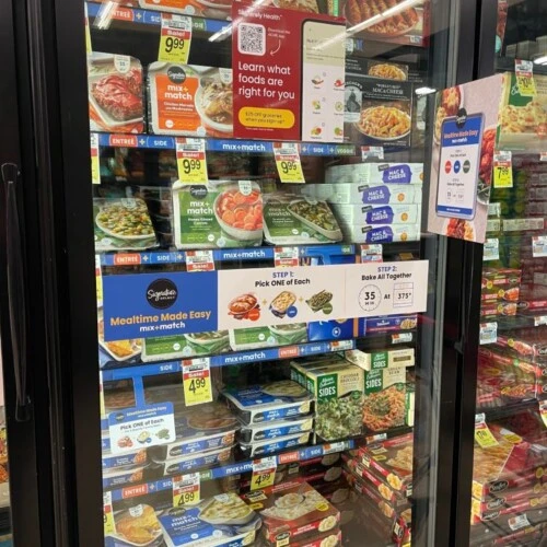Some frozen meals in the freezers at Walmart.