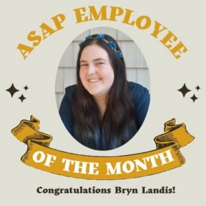 A photo of Bryn and a frame that says "ASAP Employee of the Month: Congratulations to Bryn Landis!"