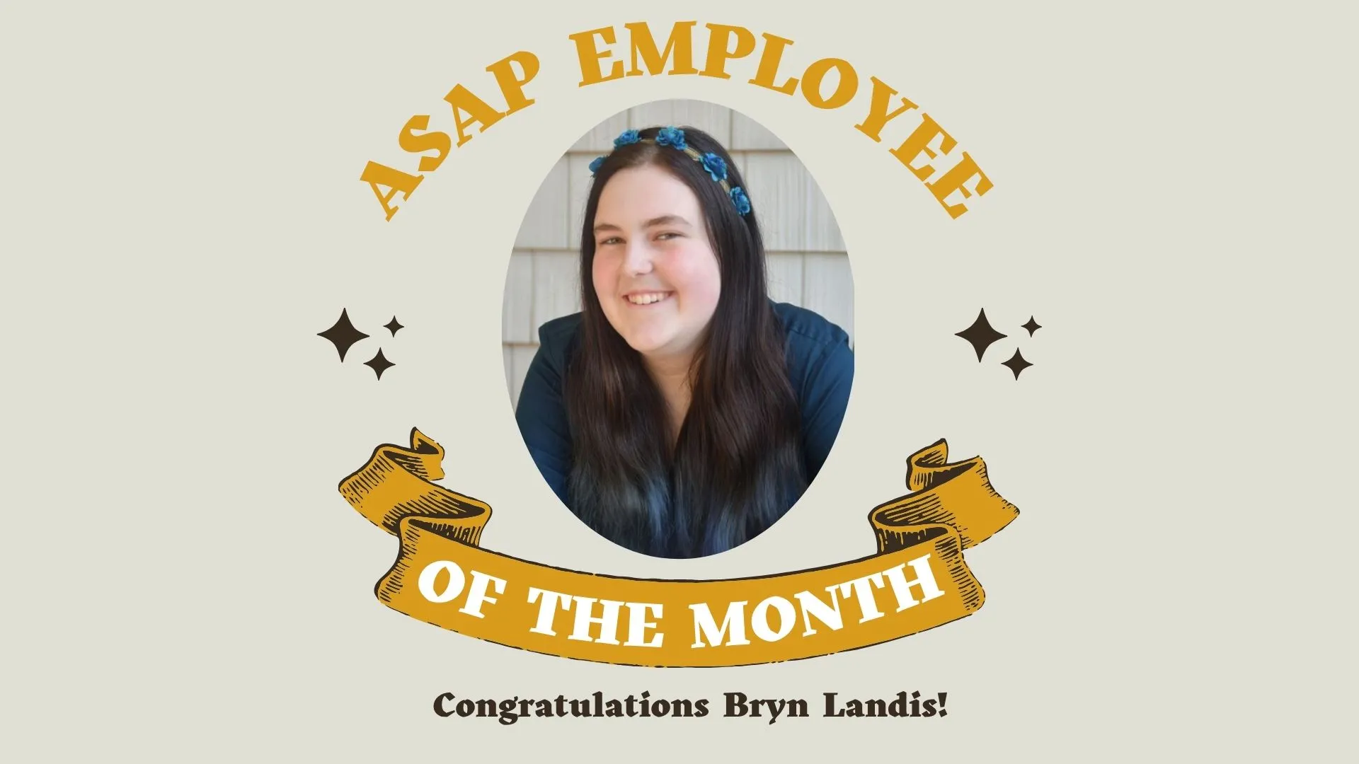 A photo of Bryn and a frame that says "ASAP Employee of the Month: Congratulations to Bryn Landis!"