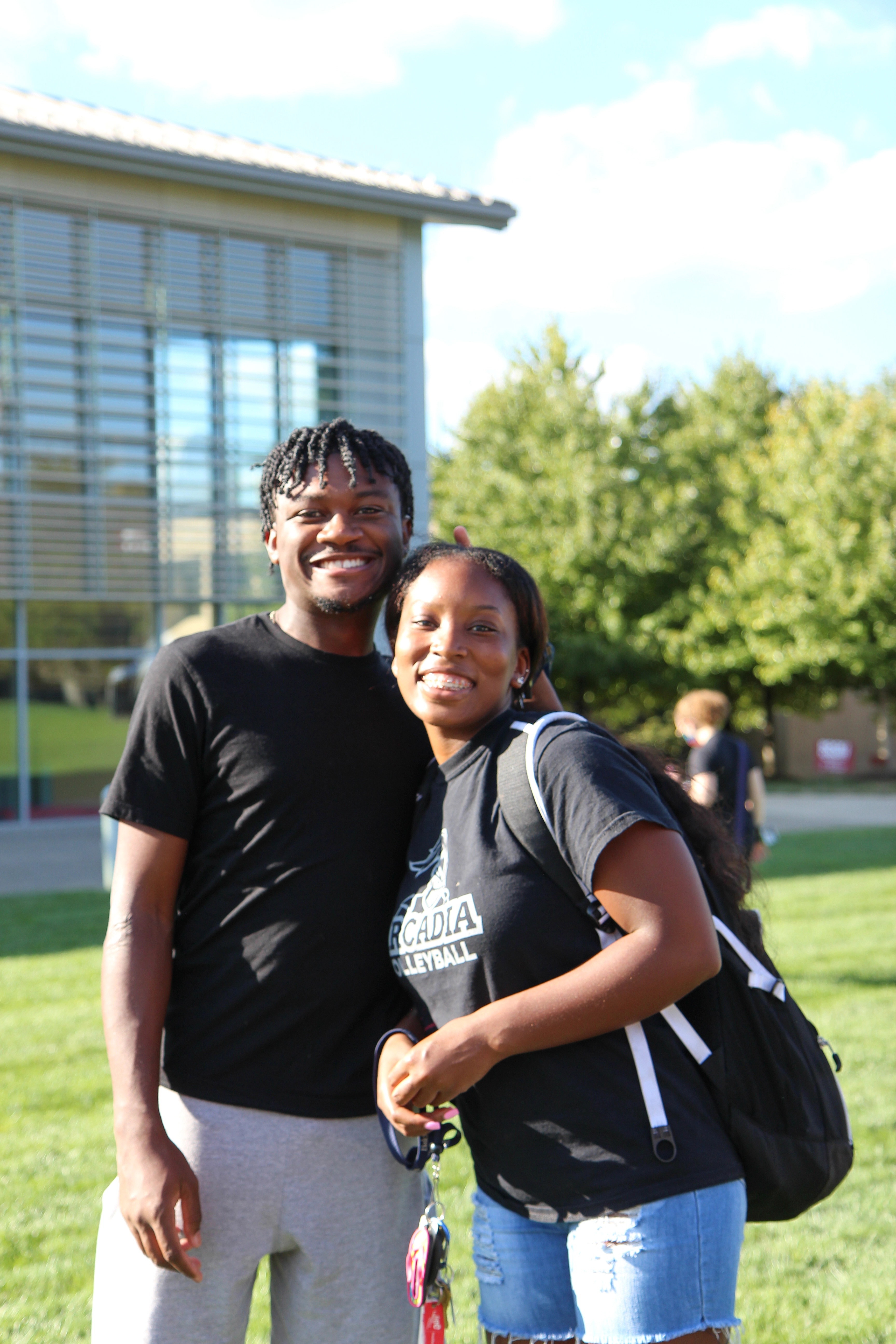 Two people posing together at the Activities Fair