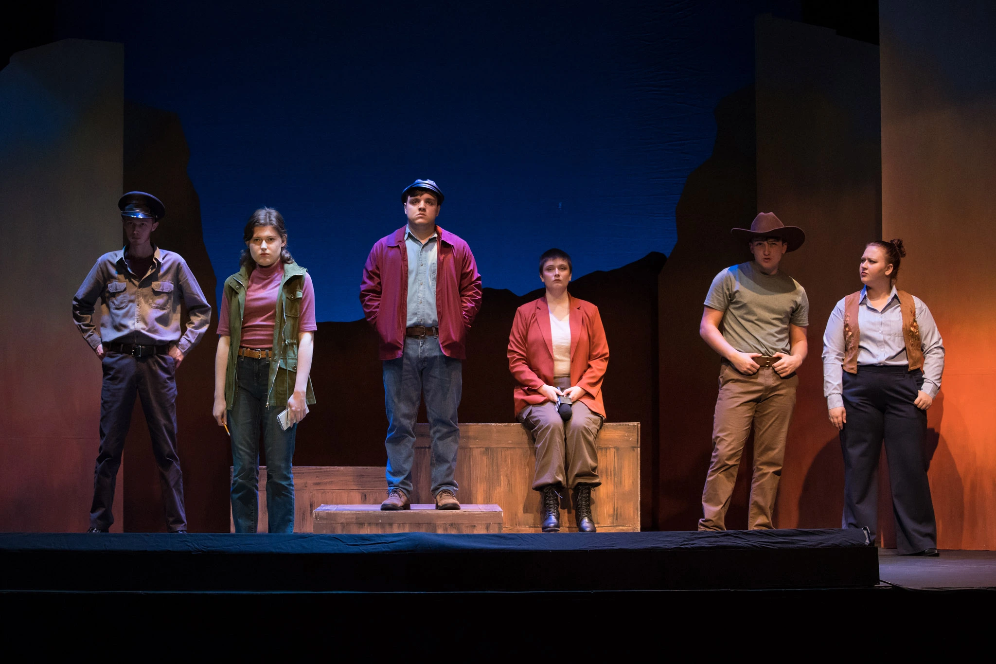Six actors on stage for The Laramie Project play.