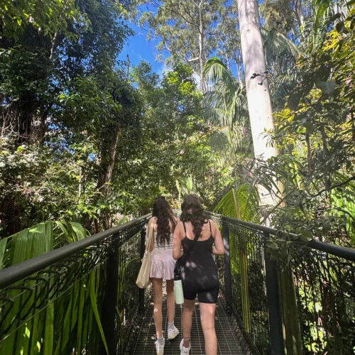 Zara Peters ’26 walking on a bridge with a friend in Australia.