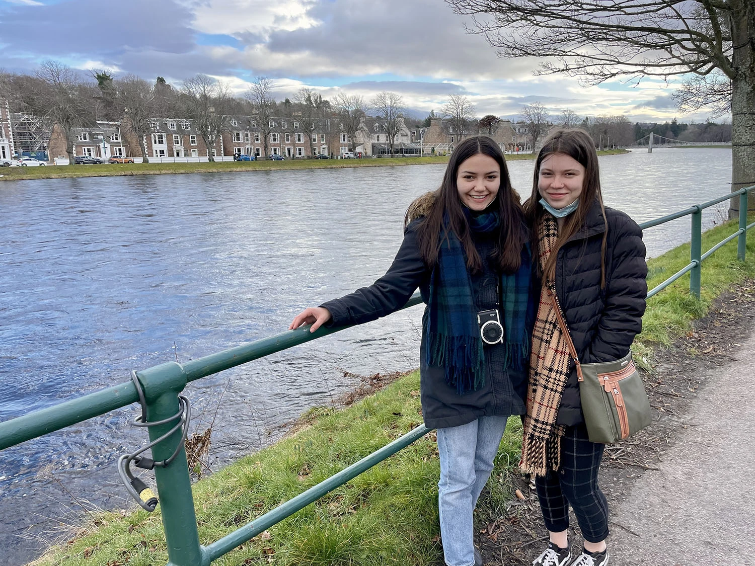 Amellia Mcguire-Matheny ’25 and Nicole Burgon ’25 standing next to a river.