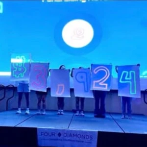 Arcadia students reveal the total amount of money raised at their fundraiser: $3,924